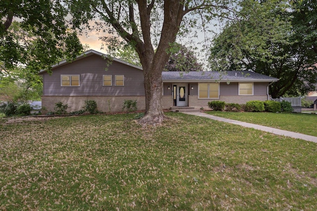 717 S Kennedy St, Shannon, IL 61078 - ranch-style house featuring brick siding and a front lawn