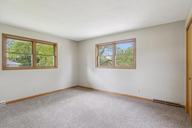 717 S Kennedy St, Shannon, IL 61078 - carpeted spare room with baseboards