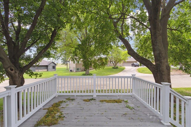 717 S Kennedy St, Shannon, IL 61078 - wooden deck featuring a yard
