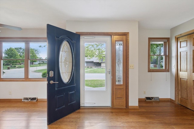 717 S Kennedy St, Shannon, IL 61078 - foyer featuring wood finished floors, ceiling fan, and baseboards