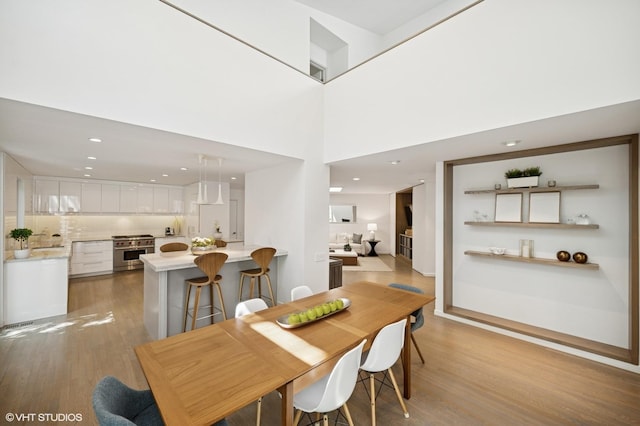 938 Old Green Bay Rd, Winnetka, IL 60093 - dining area featuring wood finished floors and recessed lighting