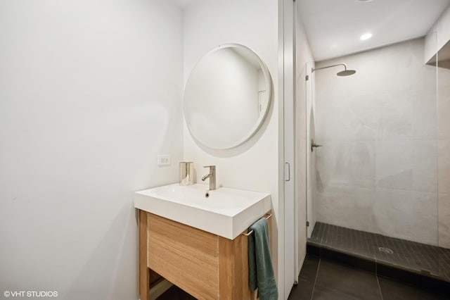 938 Old Green Bay Rd, Winnetka, IL 60093 - bathroom with vanity, tiled shower, and tile patterned flooring