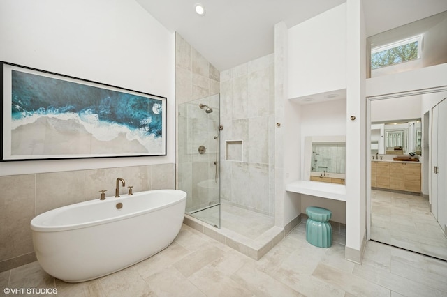 938 Old Green Bay Rd, Winnetka, IL 60093 - full bath with tiled shower, a freestanding tub, and vanity