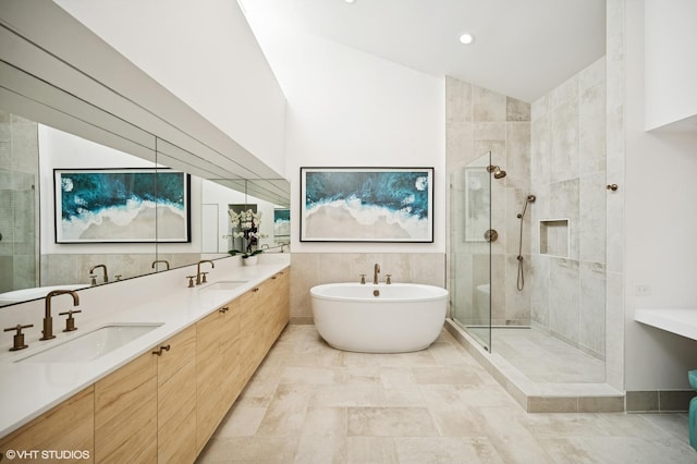 938 Old Green Bay Rd, Winnetka, IL 60093 - full bathroom featuring tiled shower, a soaking tub, double vanity, and vaulted ceiling
