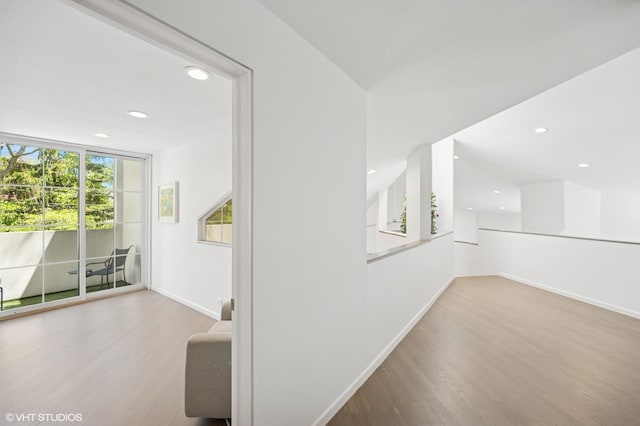 938 Old Green Bay Rd, Winnetka, IL 60093 - hall with wood finished floors, recessed lighting, and baseboards
