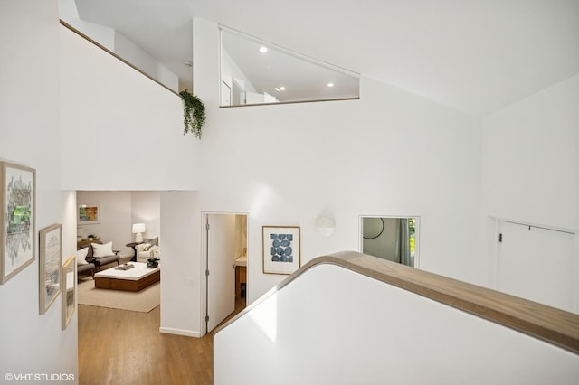 938 Old Green Bay Rd, Winnetka, IL 60093 - corridor with a high ceiling, wood finished floors, baseboards, and recessed lighting
