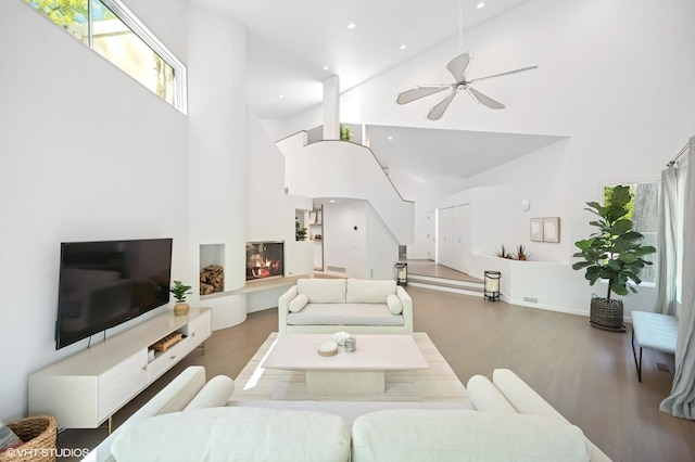 938 Old Green Bay Rd, Winnetka, IL 60093 - living area with a towering ceiling, wood finished floors, a ceiling fan, and recessed lighting