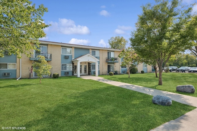 9561 Dee Rd Unit 2G, Des Plaines, IL 60016 - view of property featuring french doors, brick siding, and a front lawn