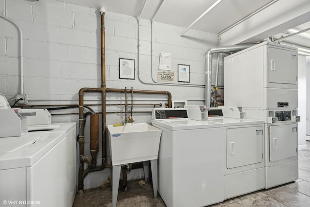 9561 Dee Rd Unit 2G, Des Plaines, IL 60016 - shared laundry featuring washing machine and clothes dryer, estacked washer and dryer, and concrete block wall