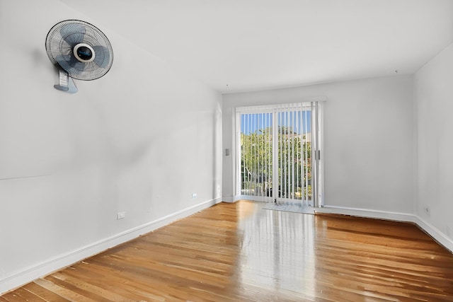 9561 Dee Rd Unit 2G, Des Plaines, IL 60016 - spare room with wood finished floors and baseboards