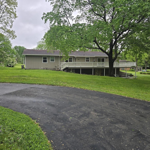 1810 Sylvan Ct, Freeport, IL 61032 - view of front of home featuring a deck and a front lawn