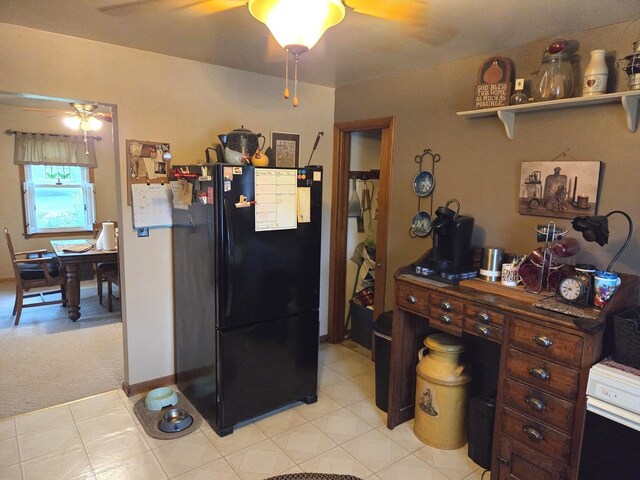405 W Randolph St, Heyworth, IL 61745 - kitchen with freestanding refrigerator, ceiling fan, open shelves, and light colored carpet