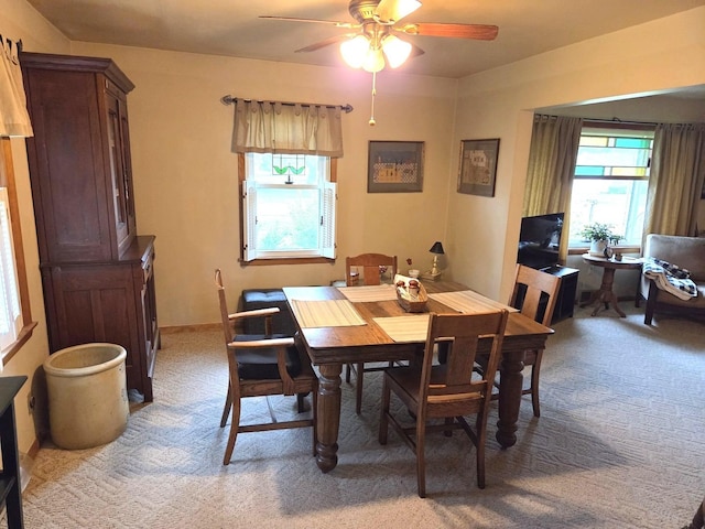 405 W Randolph St, Heyworth, IL 61745 - carpeted dining room featuring a ceiling fan