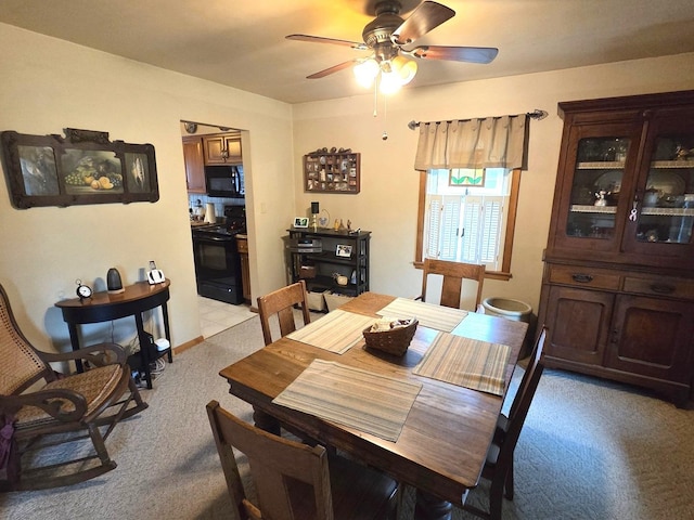 405 W Randolph St, Heyworth, IL 61745 - dining area with carpet flooring and ceiling fan