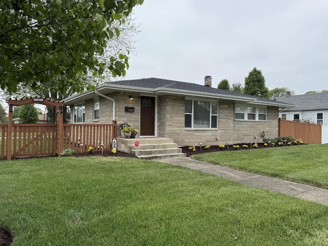 1401 Clement St, Joliet, IL 60435 - view of front of property with stone siding, a chimney, and roof with shingles