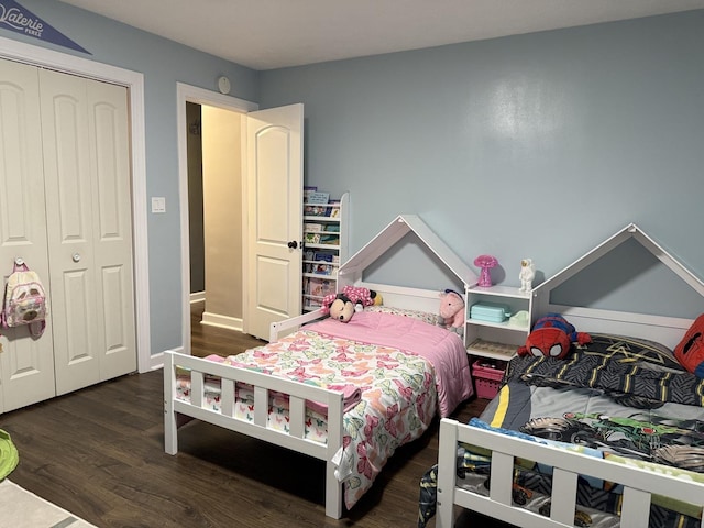 1401 Clement St, Joliet, IL 60435 - bedroom with wood finished floors, a closet, and baseboards