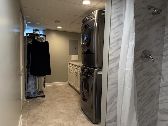 1401 Clement St, Joliet, IL 60435 - laundry area with estacked washer and dryer, electric panel, baseboards, and recessed lighting