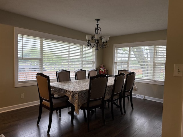 1401 Clement St, Joliet, IL 60435 - dining space featuring a chandelier, healthy amount of natural light, and baseboards