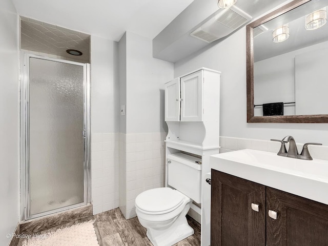 258 S Boyd Ave, Elmhurst, IL 60126 - full bath featuring a stall shower, vanity, toilet, and wood finished floors