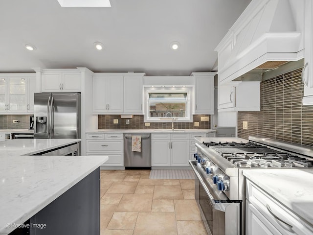 258 S Boyd Ave, Elmhurst, IL 60126 - kitchen with stainless steel appliances, decorative backsplash, white cabinets, and recessed lighting