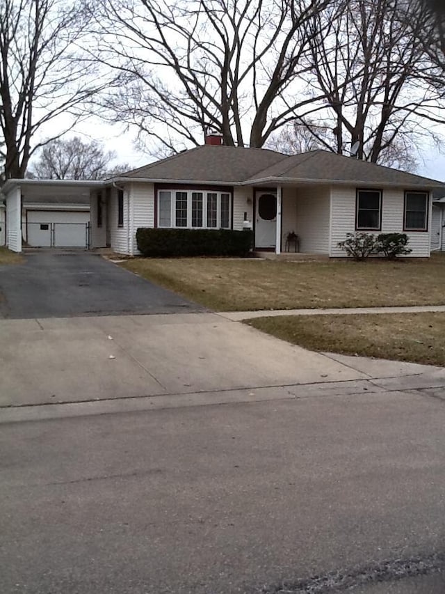 2307 Jay Ln, Rolling Meadows, IL 60008 - ranch-style home with asphalt driveway, a chimney, an attached garage, and a front lawn