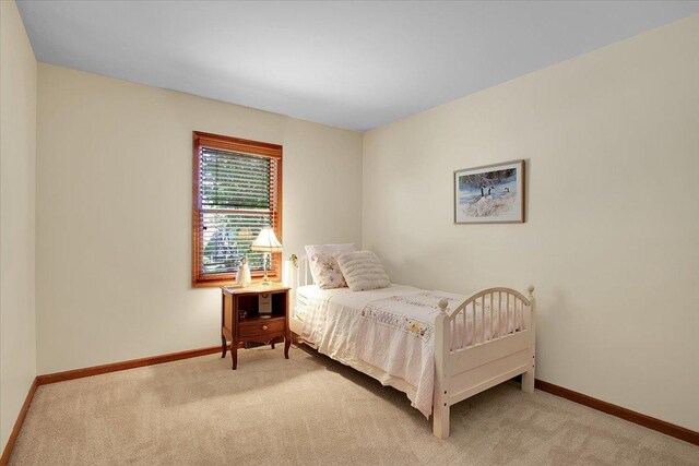 2551 Doncaster Dr, Aurora, IL 60504 - bedroom with light colored carpet and baseboards