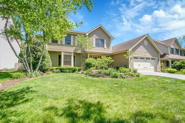 2551 Doncaster Dr, Aurora, IL 60504 - view of front of home featuring driveway, a garage, and a front yard