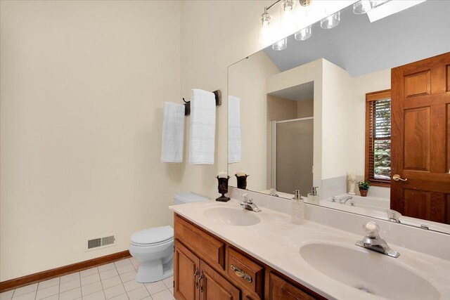 2551 Doncaster Dr, Aurora, IL 60504 - full bathroom with a shower stall, baseboards, tile patterned floors, toilet, and double vanity