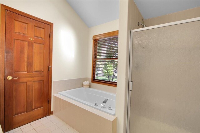 2551 Doncaster Dr, Aurora, IL 60504 - full bathroom featuring a stall shower, tile patterned floors, a garden tub, and vaulted ceiling