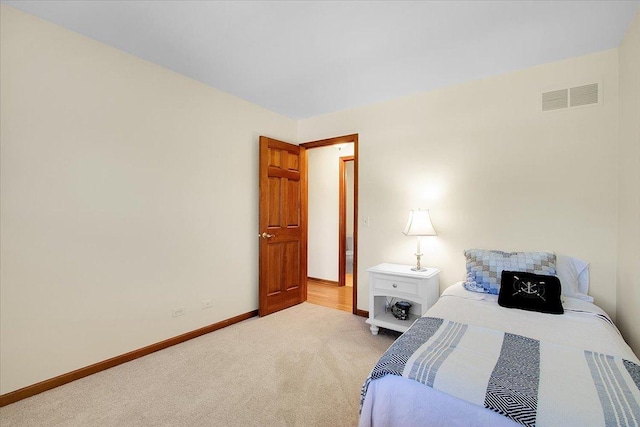 2551 Doncaster Dr, Aurora, IL 60504 - bedroom featuring light carpet and baseboards