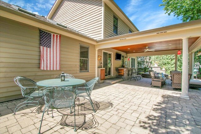 2551 Doncaster Dr, Aurora, IL 60504 - view of patio featuring ceiling fan, outdoor dining area, and an outdoor hangout area