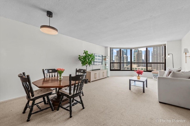405 N Wabash Ave Unit 2314, Chicago, IL 60611 - dining area with a textured ceiling and carpet floors