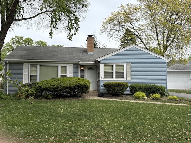 159 S Brockway St, Palatine, IL 60067 - view of front of house with a chimney, a front lawn, and a detached garage