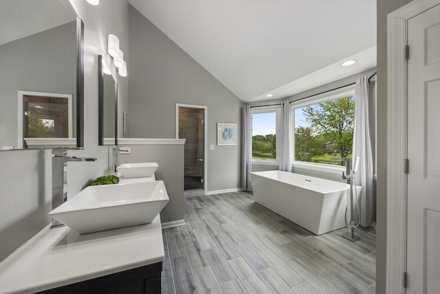 20707 N Swansway, Deer Park, IL 60010 - full bathroom with a tile shower, wood finished floors, a freestanding bath, recessed lighting, and baseboards