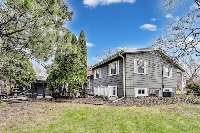 708 S Edgewood Ln, Mount Prospect, IL 60056 - view of side of property with a lawn and central air condition unit