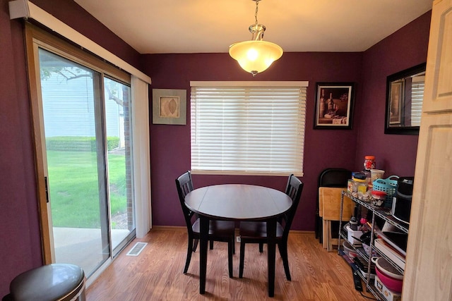 1338 Stratford Dr Unit 1338, Gurnee, IL 60031 - dining space with wood finished floors and baseboards