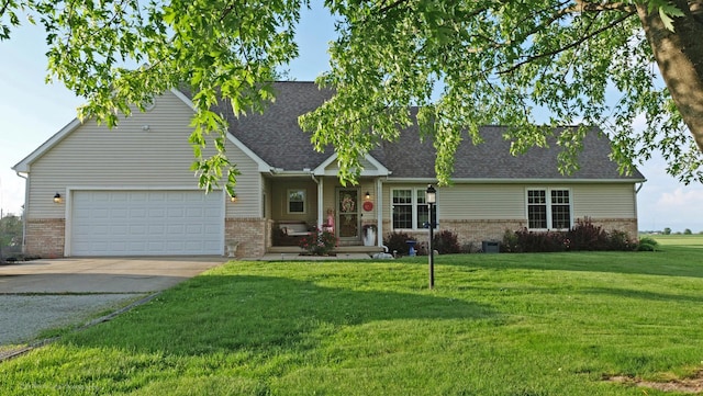 29 N Deer Lk N, Villa Grove, IL 61956 - cape cod home featuring brick siding, driveway, a garage, and a front lawn