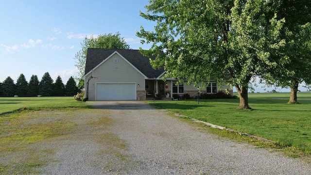 29 N Deer Lk N, Villa Grove, IL 61956 - view of front facade featuring a garage, gravel driveway, and a front lawn