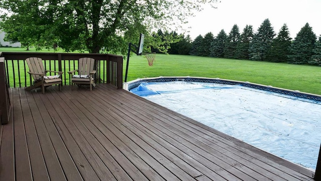 29 N Deer Lk N, Villa Grove, IL 61956 - wooden deck with a lawn and an outdoor pool