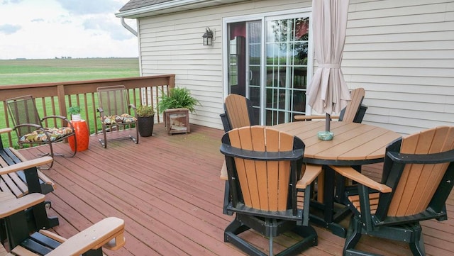 29 N Deer Lk N, Villa Grove, IL 61956 - wooden deck with outdoor dining area and a view of countryside