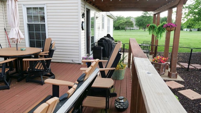 29 N Deer Lk N, Villa Grove, IL 61956 - wooden terrace with a lawn and outdoor dining area