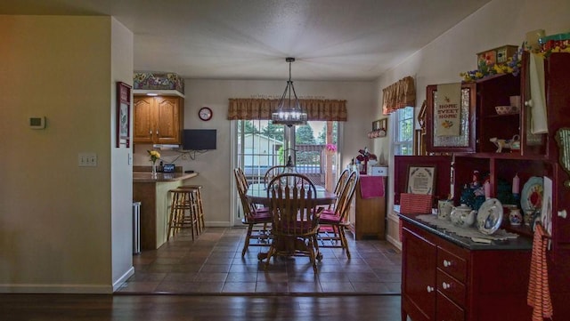 29 N Deer Lk N, Villa Grove, IL 61956 - dining area with baseboards and a chandelier