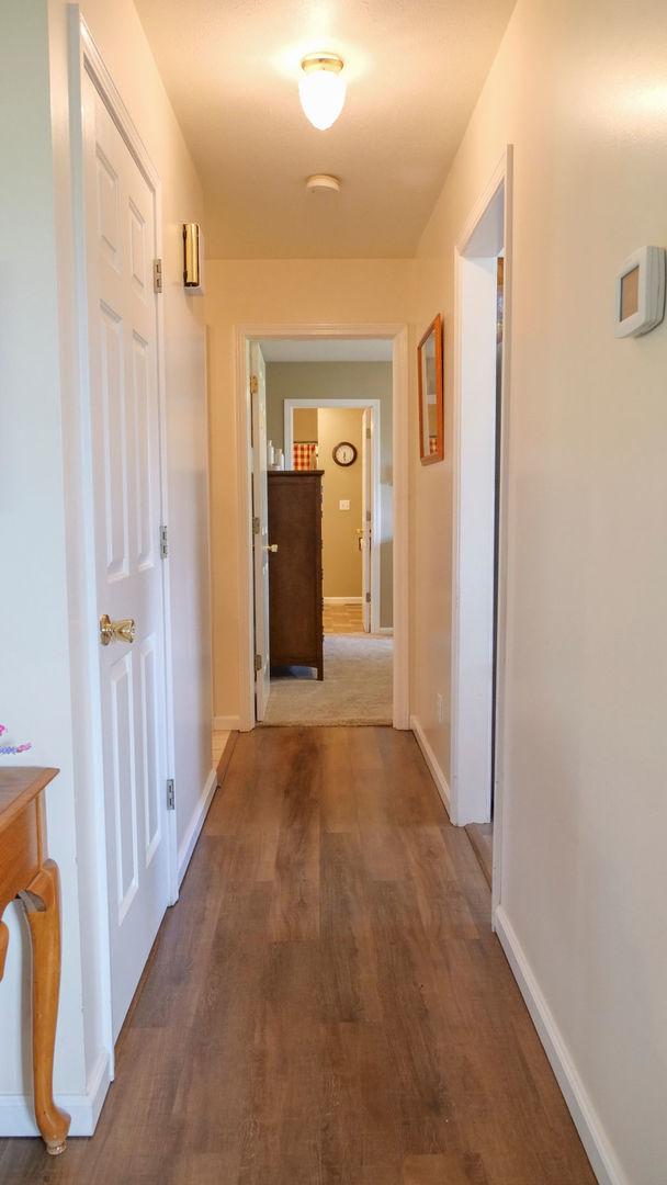29 N Deer Lk N, Villa Grove, IL 61956 - hallway with wood finished floors and baseboards