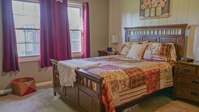 29 N Deer Lk N, Villa Grove, IL 61956 - bedroom featuring multiple windows, carpet flooring, and baseboards
