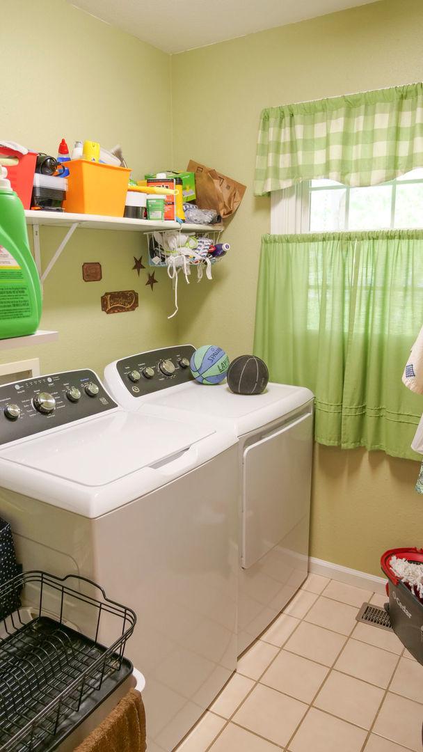 29 N Deer Lk N, Villa Grove, IL 61956 - washroom featuring washing machine and dryer and tile patterned flooring
