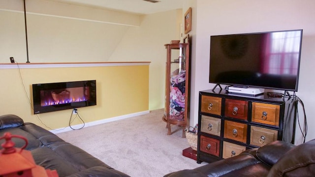 29 N Deer Lk N, Villa Grove, IL 61956 - living room with carpet flooring, vaulted ceiling, and baseboards