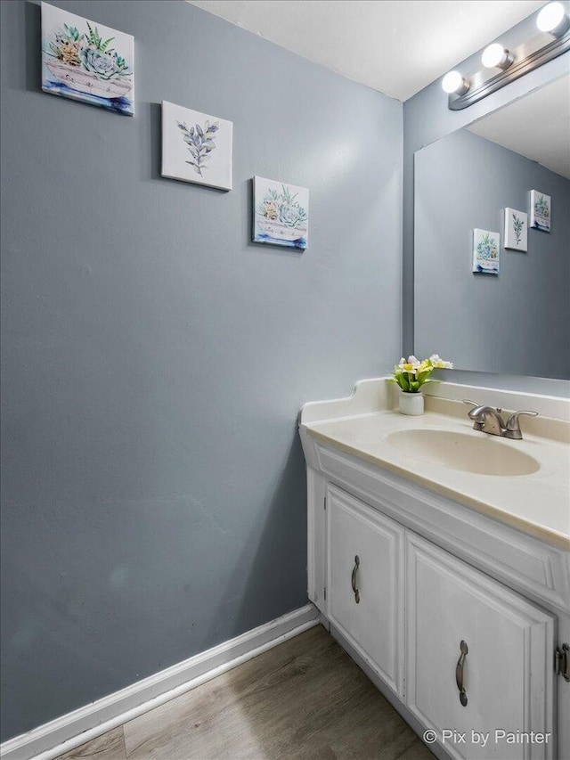 285 Colony Green Dr, Bloomingdale, IL 60108 - bathroom featuring wood finished floors and vanity