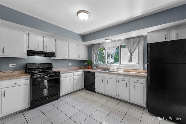 285 Colony Green Dr, Bloomingdale, IL 60108 - kitchen with black appliances, under cabinet range hood, light countertops, and white cabinetry