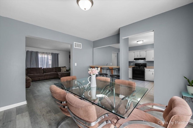 285 Colony Green Dr, Bloomingdale, IL 60108 - dining space with light wood finished floors