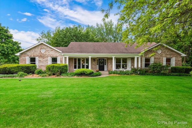 39W889 Deer Run Dr, Saint Charles, IL 60175 - ranch-style home featuring brick siding, a front lawn, and a porch